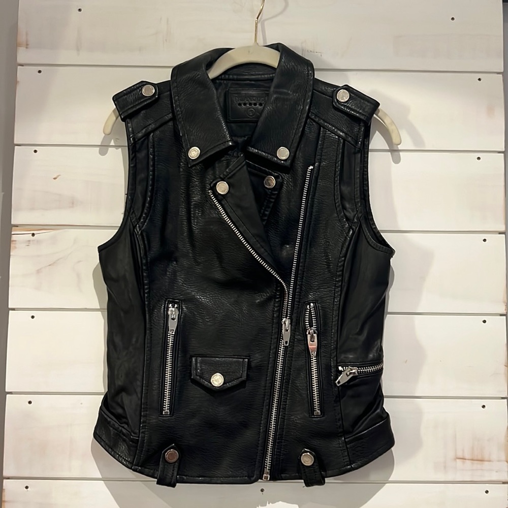 Unique, faux leather motto vest (looks like real leather), perfect condition.